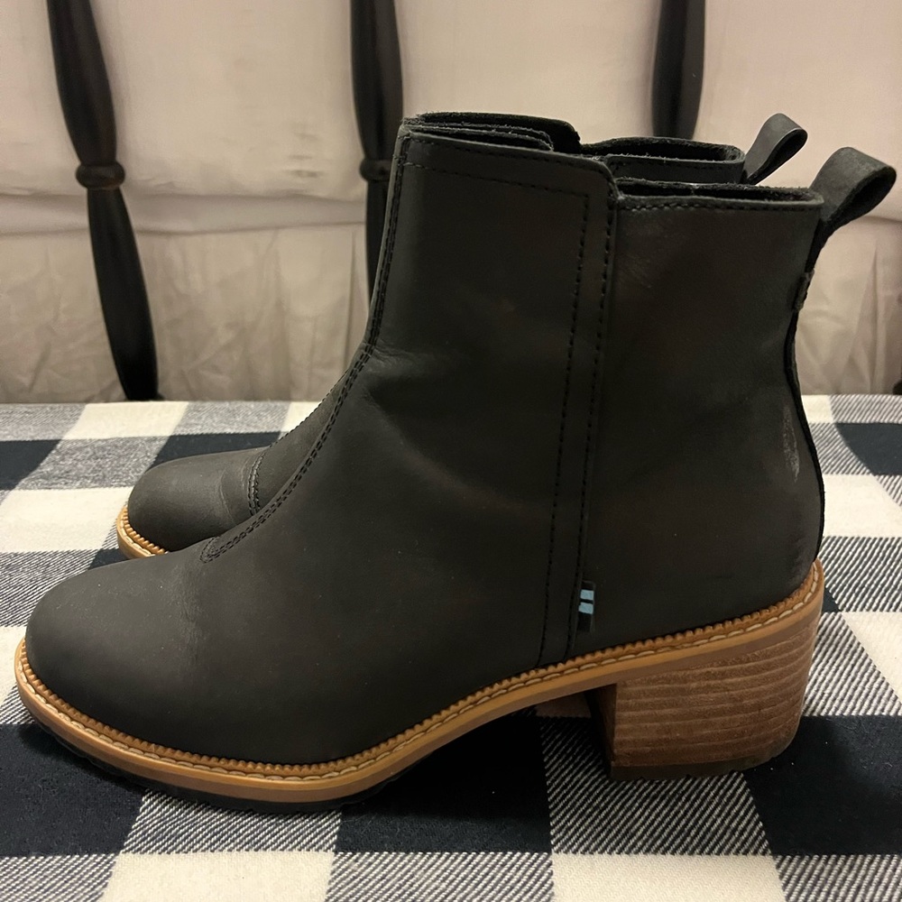 Toms black leather half boot.